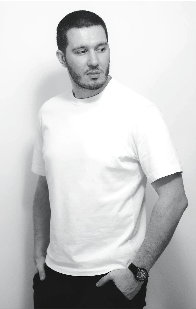 Portrait of Yulian in a white T-shirt